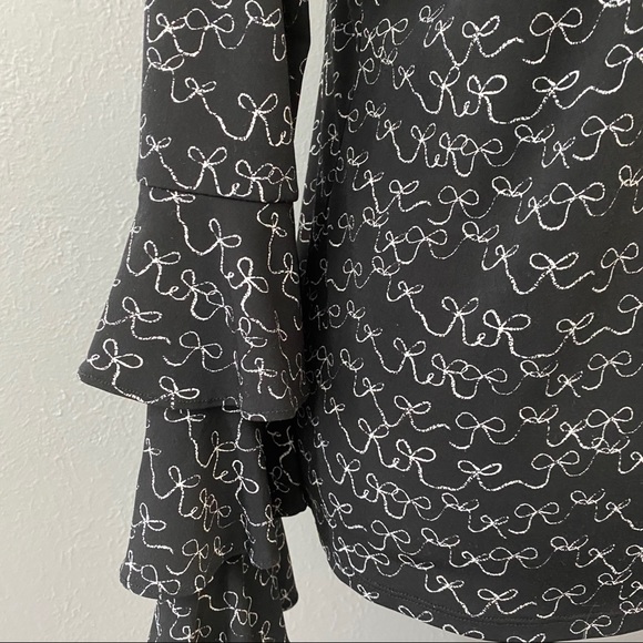 CeCe Danity Tiered Ruffled Bell Sleeve Bow Blouse - Picture 9 of 11